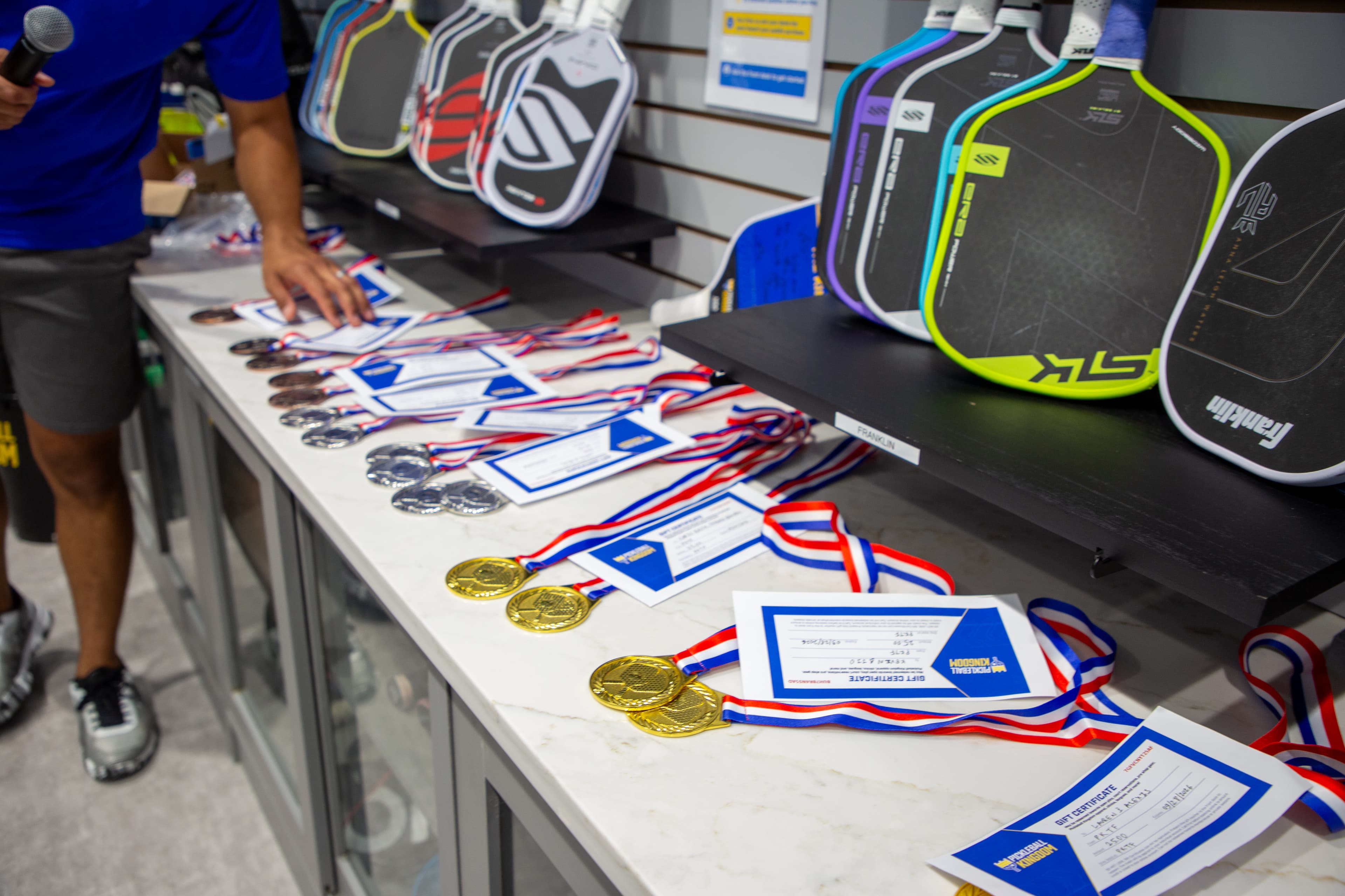 Medals and gift certificates at the Kingdom Summer Championships